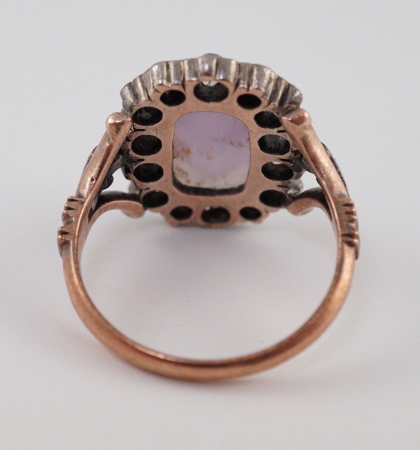 A 19th century gold, carved amethyst and diamond cluster set dress ring